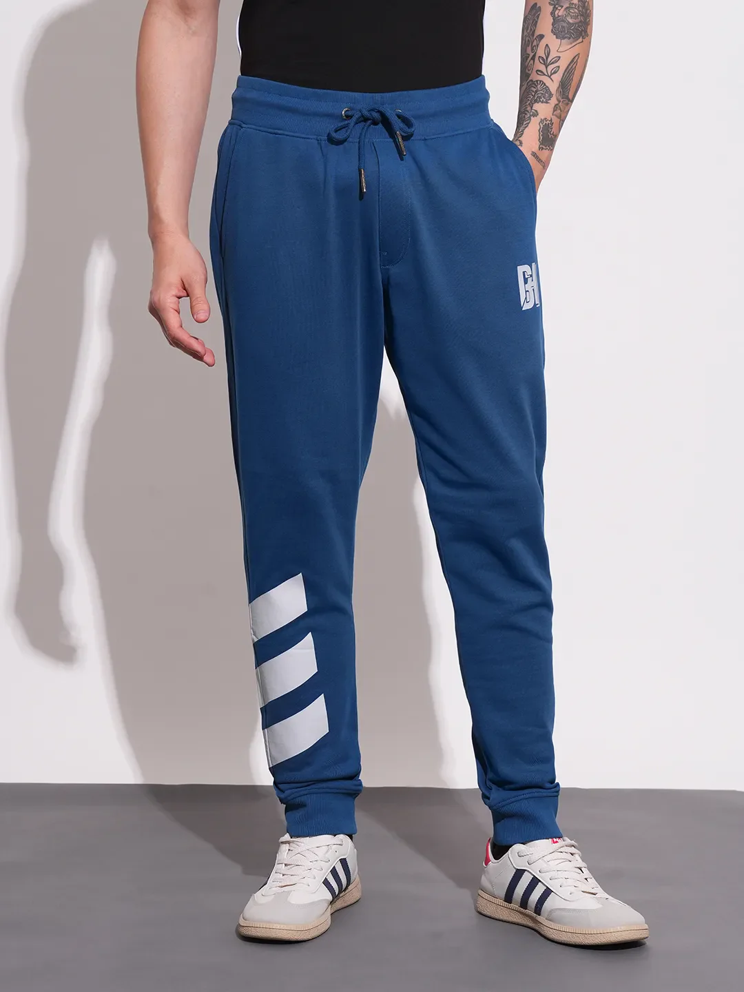 Blue Regular fit Men's Track Pants by Being Human Clothing