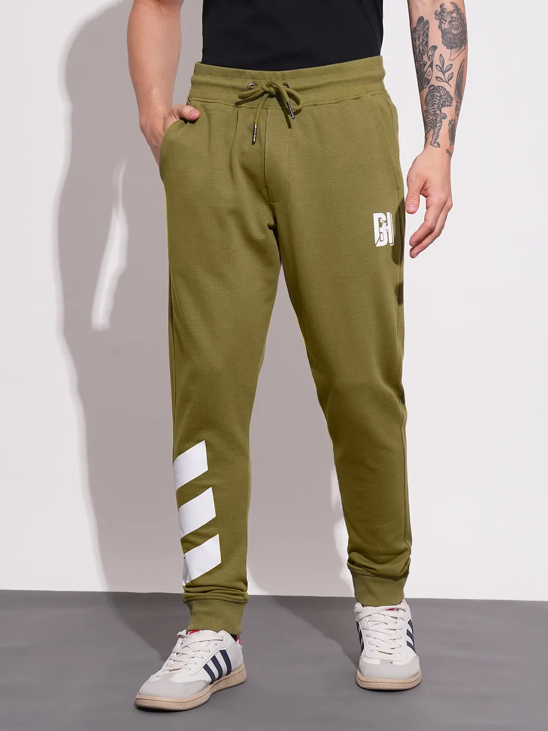 Olive Regular fit Men's Track Pants by Being Human Clothing