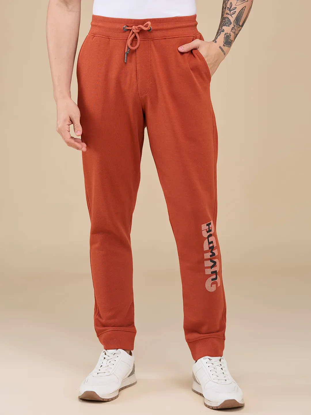 Orange Regular fit Men's Track Pants by Being Human Clothing
